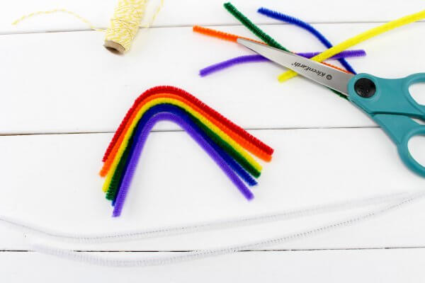 Build a rainbow out of pipe cleaners to grow crystals